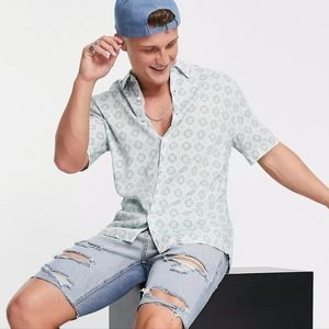 River Island short sleeve tile print shirt in blue. Size L